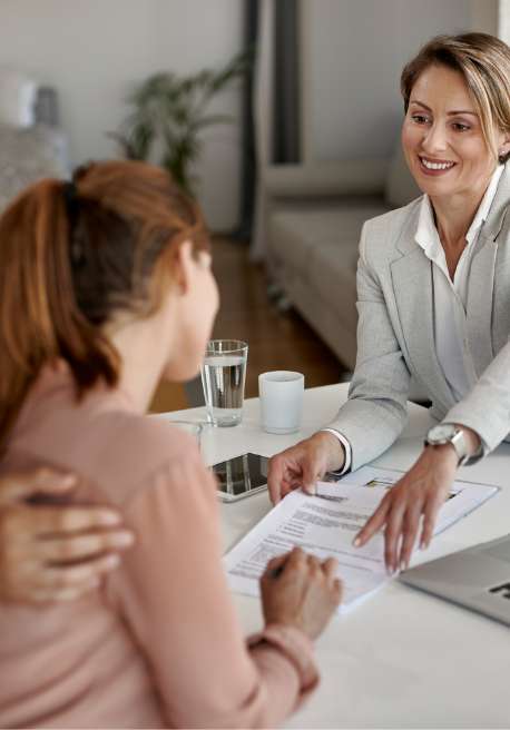 Investor sits across from a securities attorney and reviews their recovery options.